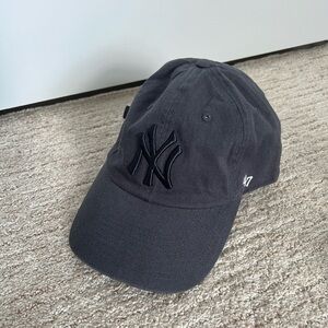 Gray New York Yankees hat with adjustable strap
